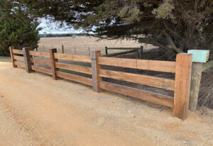 Three rail timber fence