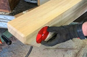 Timber bollard with reflector