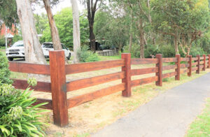 Australian hardwood post and rail timber fence
