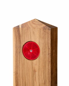 Timber bollard with red safety reflector